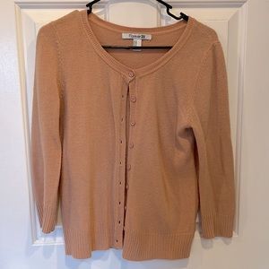 Salmon colored short cardigan